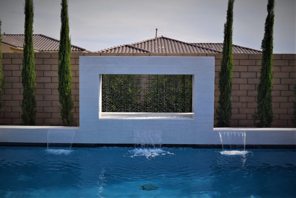 A pool with water jets and a wall A pool with water jets and a wall